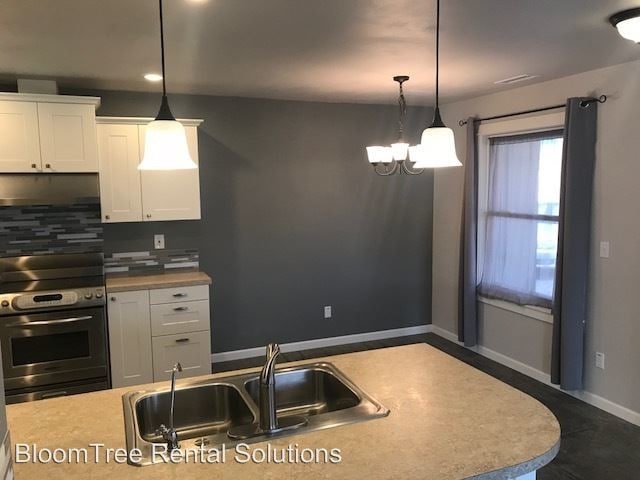 Building Photo - 3560 Sunset Dr
