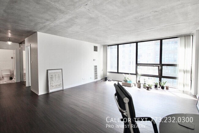 Building Photo - Available July 1st! Sun-filled Oversized 1...
