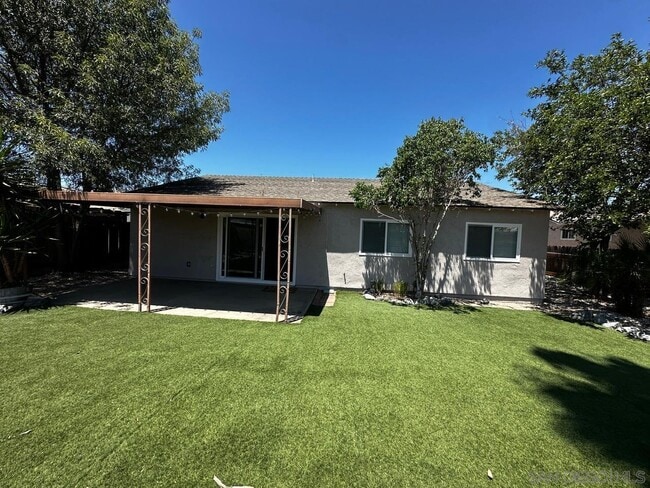 Building Photo - 10017 Woodrose Ave