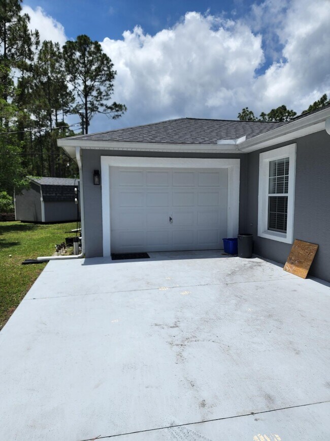 ONE CAR GARAGE THAT IS AIR CONDITIONED - 64 Pony Express Dr