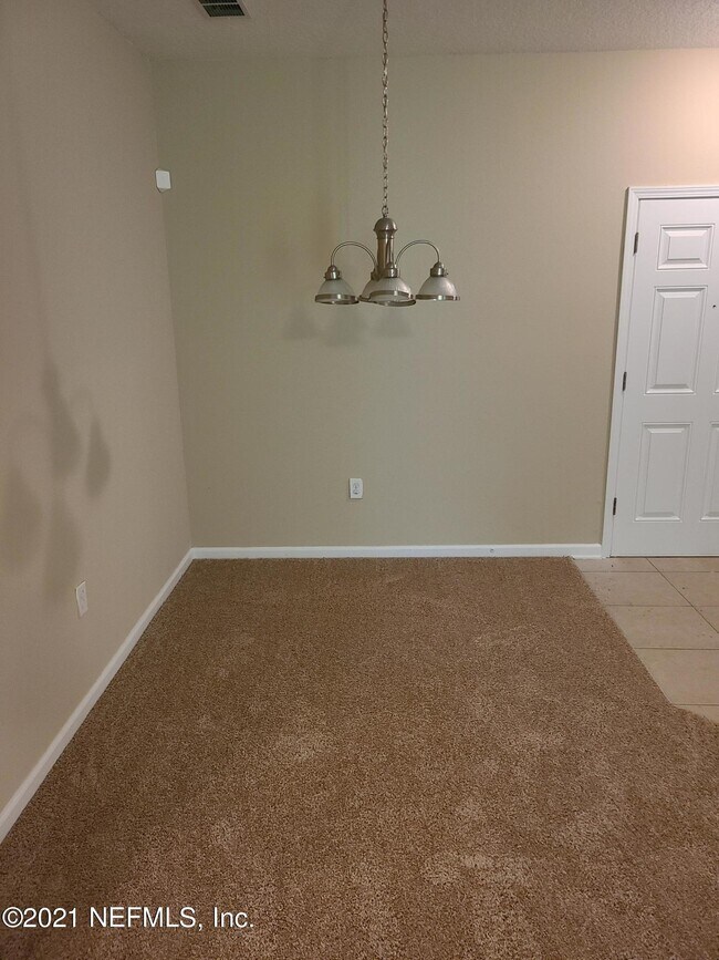 Building Photo - 6935 Ortega Woods Dr