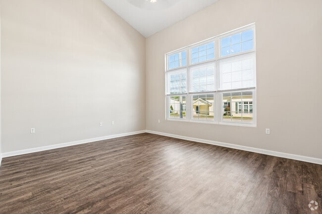 3BR, 2BA - 1,200SF - Living Room - Brushwood Apartments