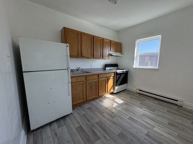 Building Photo - COMING SOON - Charming 2-Bedroom Apartment...