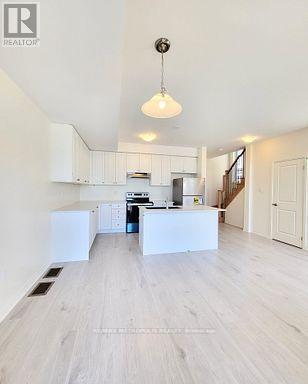 Photo du bâtiment - 20 Esquire Wy