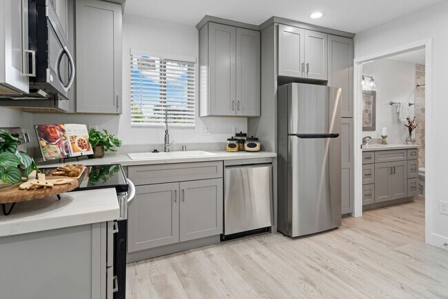 Building Photo - Introducing a charming bungalow-style unit...
