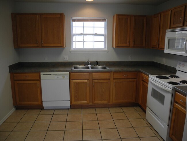 Foto del edificio - Condominium in Academy Commons