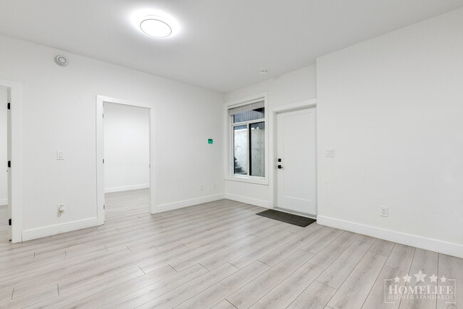 Building Photo - Bright 2 Bedroom Legal Basement Suite | Utilities Included | Prime Delta Location