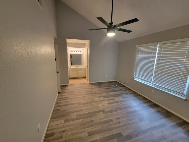 Primary bedroom - 12247 W Village Dr