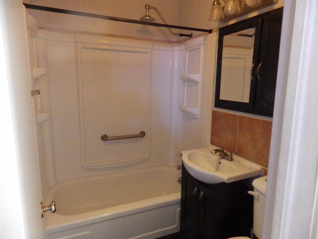 bathroom with rain head shower - 420 N Railroad St