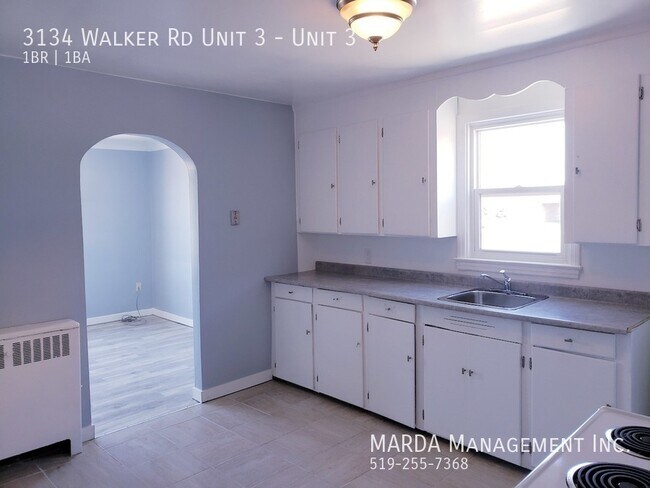 Photo du bâtiment - SPACIOUS 1 BED/1 BATH UNIT ON WALKER! + HYDRO