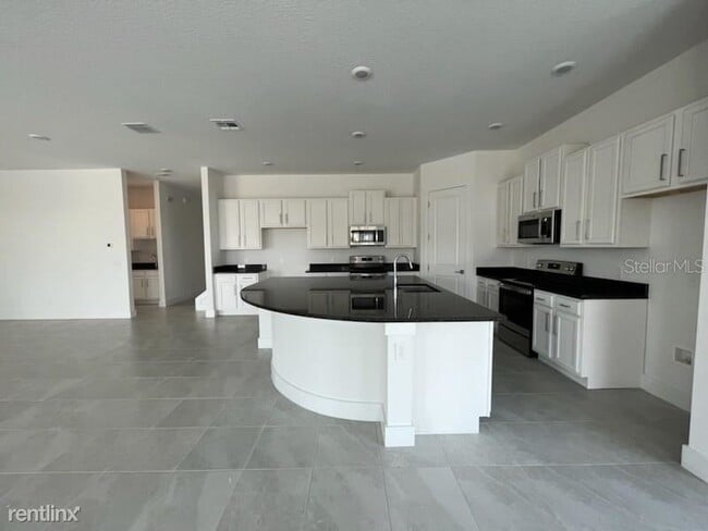 Building Photo - 12 br, 8.5 bath House - 1009 Coyote Creek ...