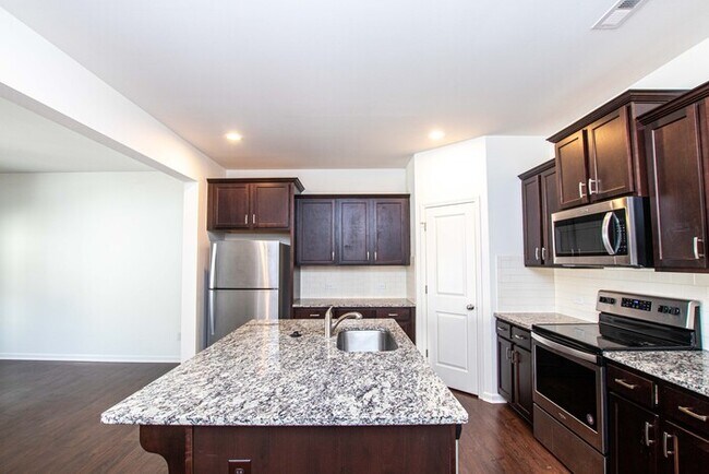 Building Photo - 2-Car Garage Bonterra Townhome