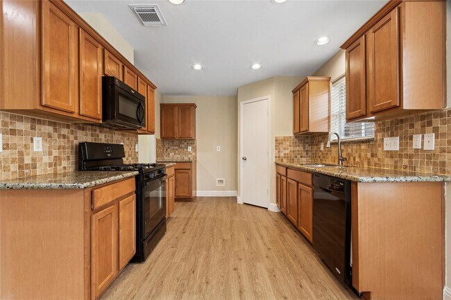 Foto del edificio - 8907 Grand Villa Ln