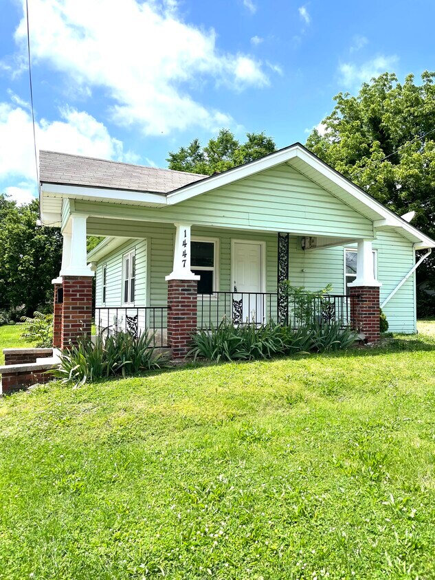 Front - 1447 N Rogers Ave