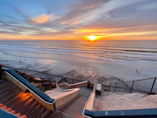 Building Photo - THE BEACH IS YOUR BACKYARD! Light & Bright...