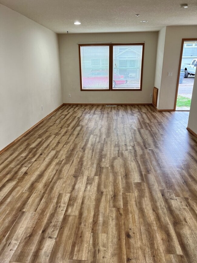 Building Photo - Beautiful Home with LVP Flooring, W/D, Garage, Back Yard, and MORE!