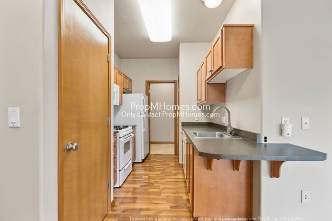 Building Photo - Chic One-Bedroom Condo in Vibrant Bethany ...
