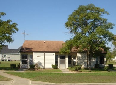 Building Photo - Gee Corbett Village Apartments