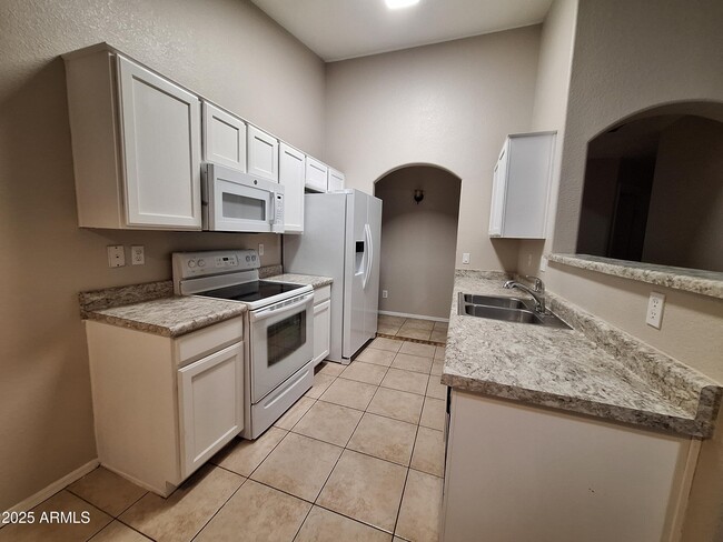 Building Photo - 9345 E Onza Ave