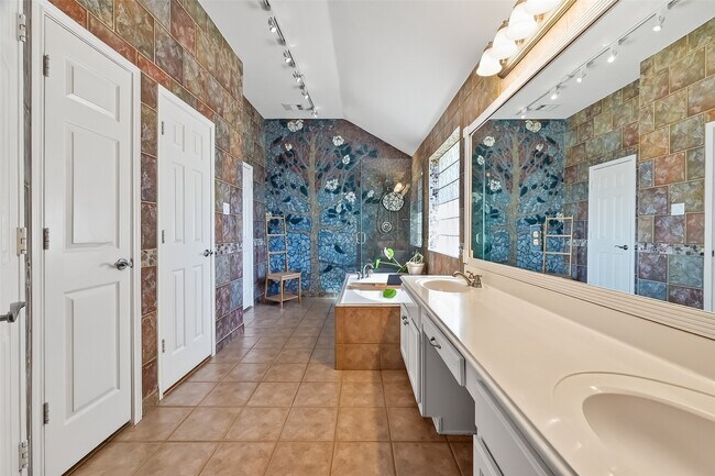 Foto del edificio - 10827 Oak Bayou Ln