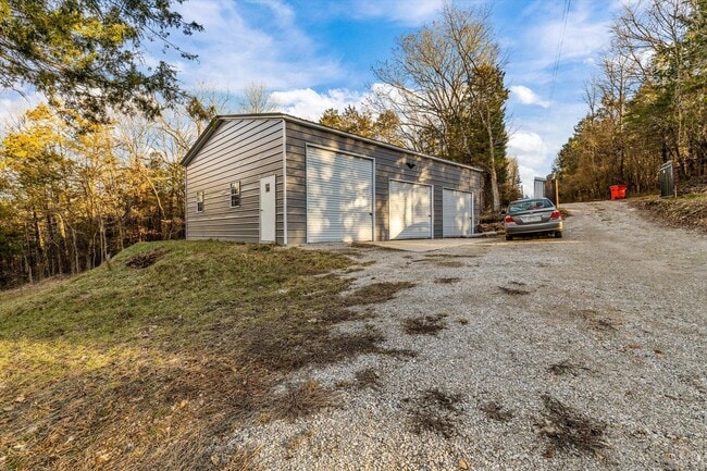 shop available for $300/more a month. - 27497 Old Pace Ln