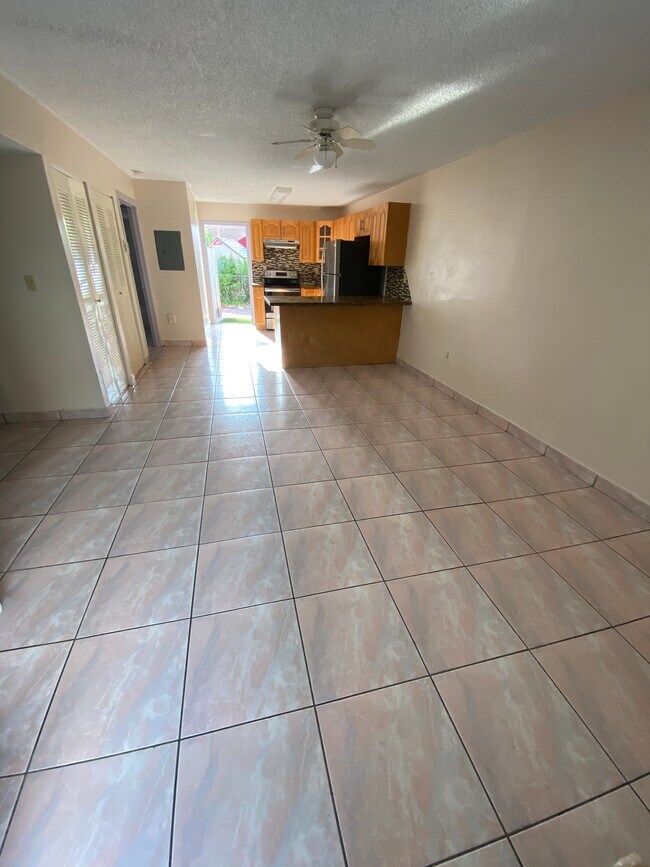 Looking in from front door - 427 SW 77th Ave