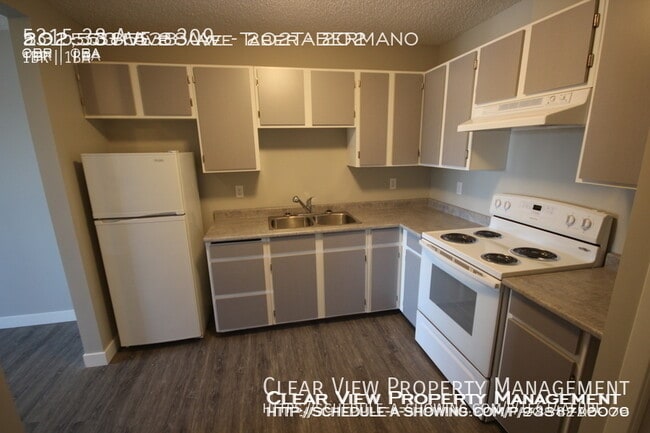 Photo du bâtiment - One Bedroom Suite in Taber Manor! ?Showings available at (587) 429-5071?
