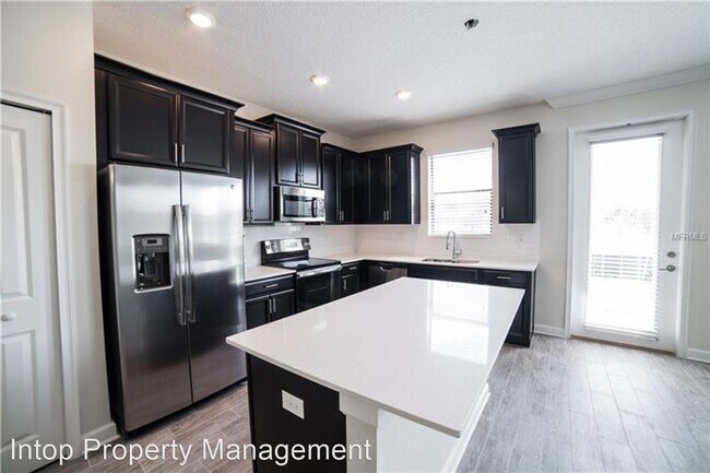 Building Photo - 3 br, 2.5 bath House - 1235 Payne Stewart Dr