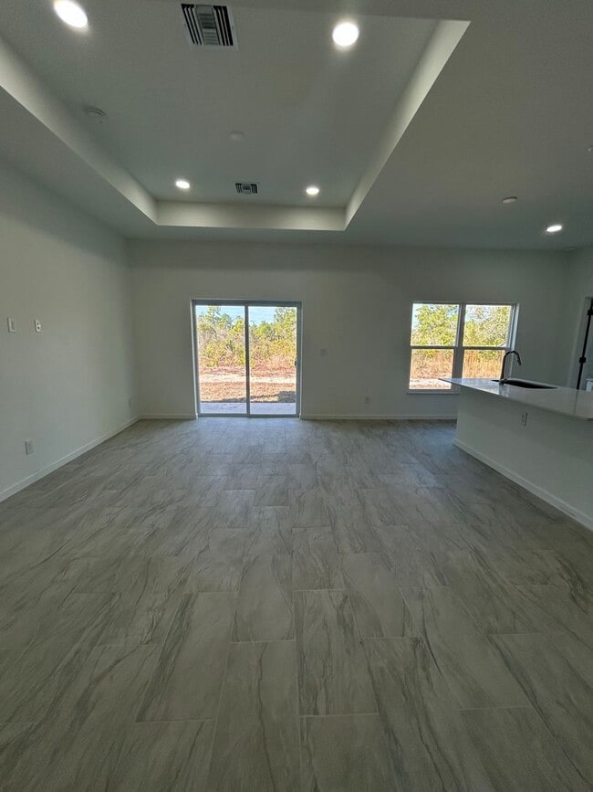 Building Photo - JUST BUILT! Spacious 4/2/2 Home -Perfect for Your Family in SW Lehigh Acres