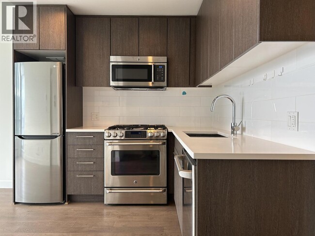 Building Photo - 9060 University Crescent