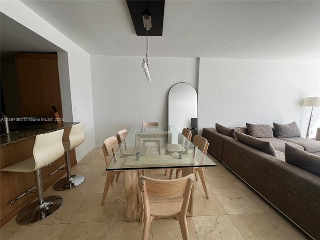 Building Photo - 10275 Collins Ave