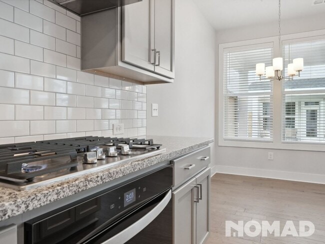 Building Photo - New construction 4 Bedroom Townhome in Cum...