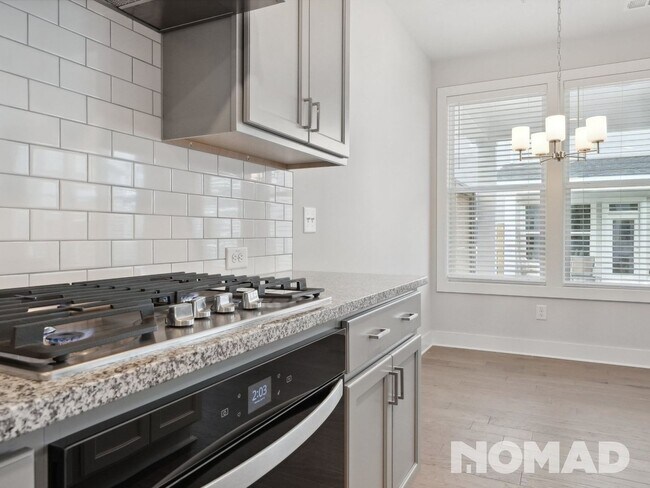 Foto del edificio - New construction 4 Bedroom Townhome in Cum...