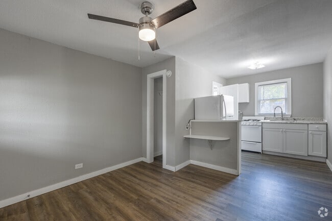 Living Area with Built-In Dining Table - Lux Riverside Apartments