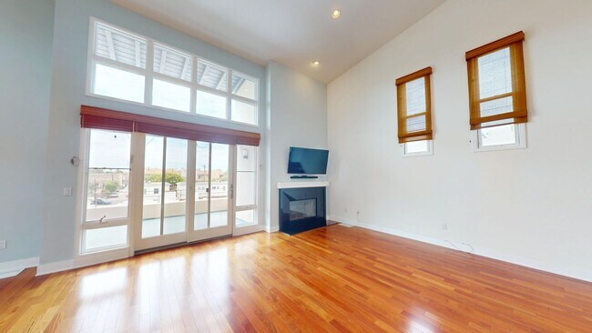 Building Photo - Luxurious Condominium | Rooftop Deck with Bay and Downtown Views
