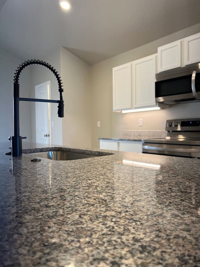 Building Photo - New Beginnings Start With AMRR: 3 Bedroom Available NOW