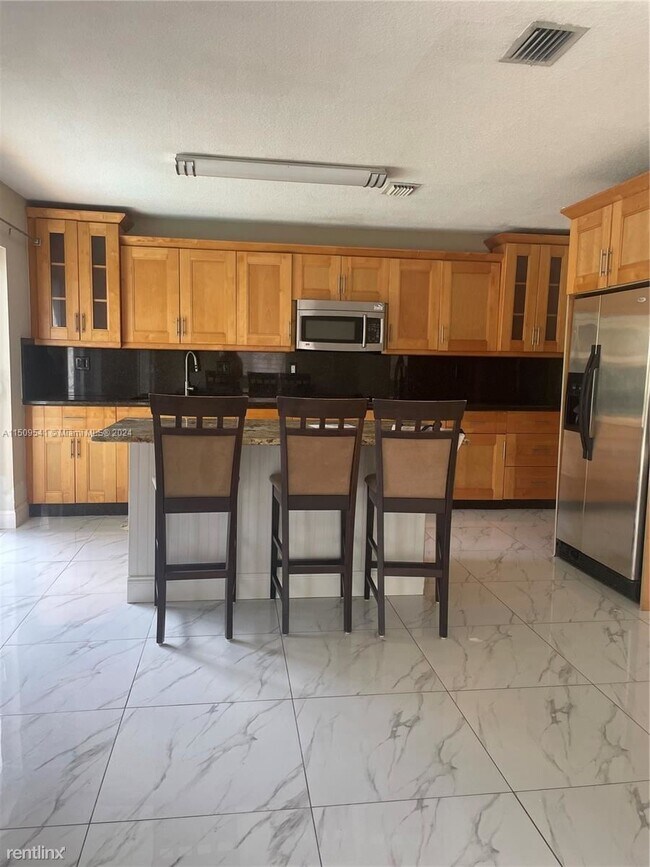 Foto del edificio - 3 br, 2.5 bath House - 9913 SW 147th Ct # 0