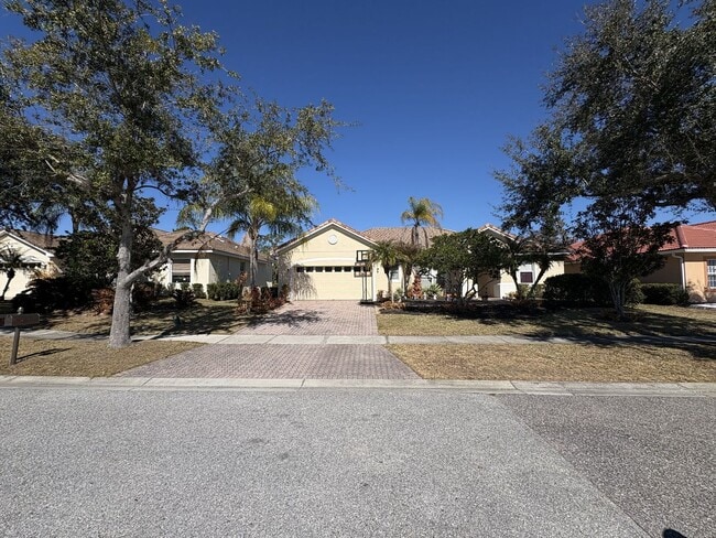 Building Photo - Florida Living Starts Here — Gated, Single-Story, Move-In Ready May 1!