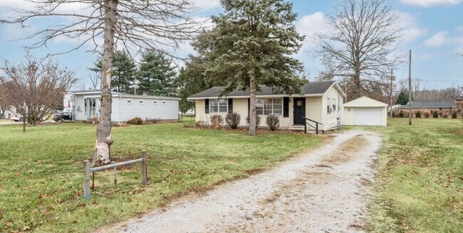 Building Photo - DEPOSIT MOVES YOU IN! No rent due until Ap...