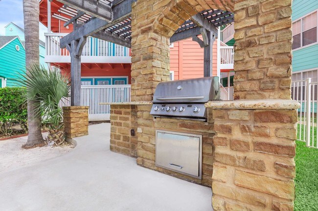 Parrilla al lado de la piscina - Residence at West Beach