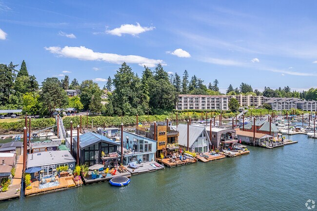 House boats sit on the river.
