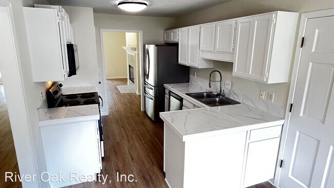 Building Photo - 4 br, 2 bath House - 5473 Arborcrest Cir