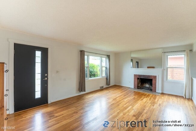Building Photo - 4 br, 2 bath House - 10427 63rd Ave S, Sea...