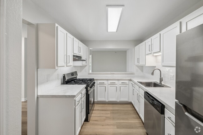 2 habitaciones, 2 baños - 1070 pies cuadrados - Cocina - The Apartments at Wellington Trace