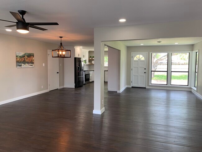 Open Living, Dining, Kitchen and Sitting Room (Back Door) - 332 Doddridge St