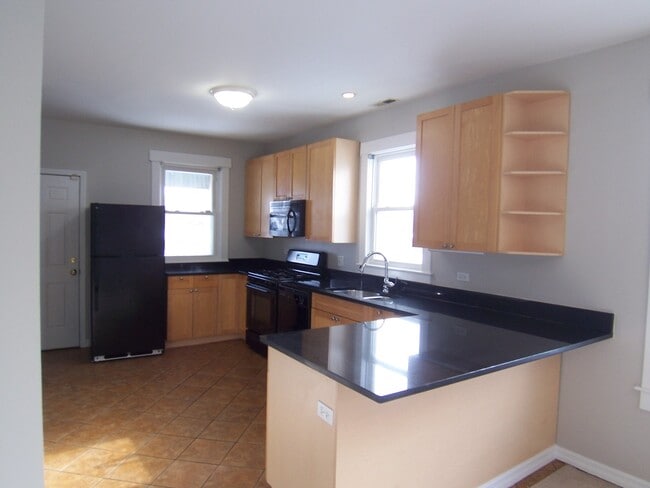 Foto del edificio - 1419 Darrow Ave