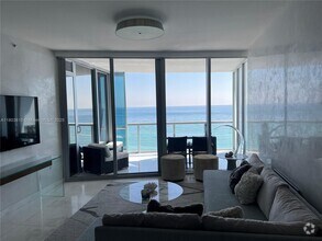 Building Photo - 17121 Collins Ave