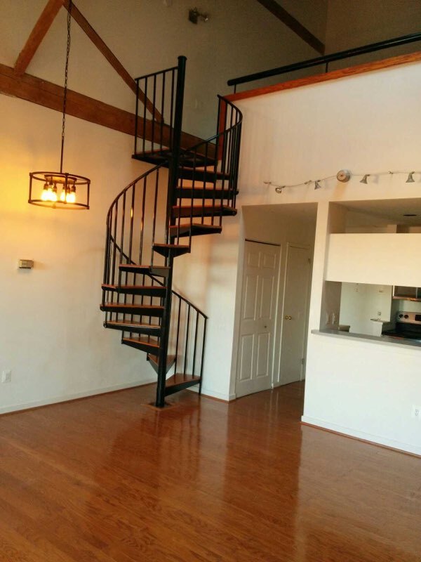 Spiral staircase from main level to loft - 2639 Boston St