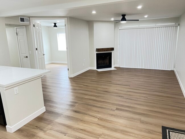 Family room. Everything is new. Real wood burning fireplace - 2935 N 68th St