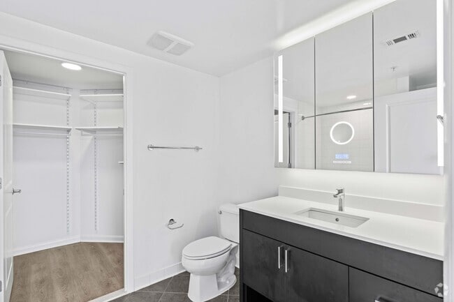 2BR, 2BA - 1,158SF - Closet, Bathroom 1 - The Millennium